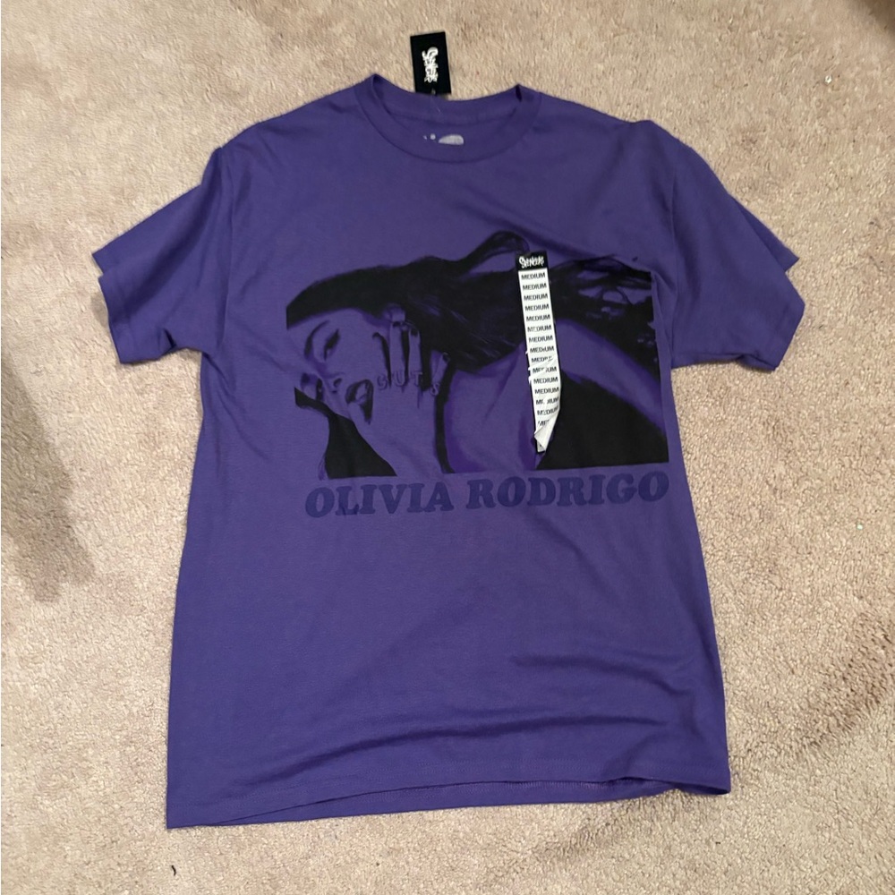 BRAND NEE Olivia Rodrigo Guts Purple Tshirt Spencer’s